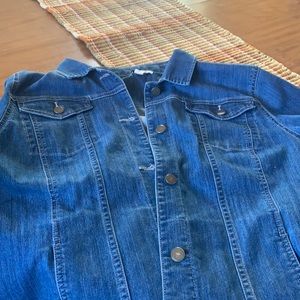 This is a used Jean jacket in good condition